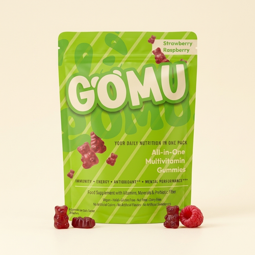GOMU Daily pouch on warm cream background with gummy bears