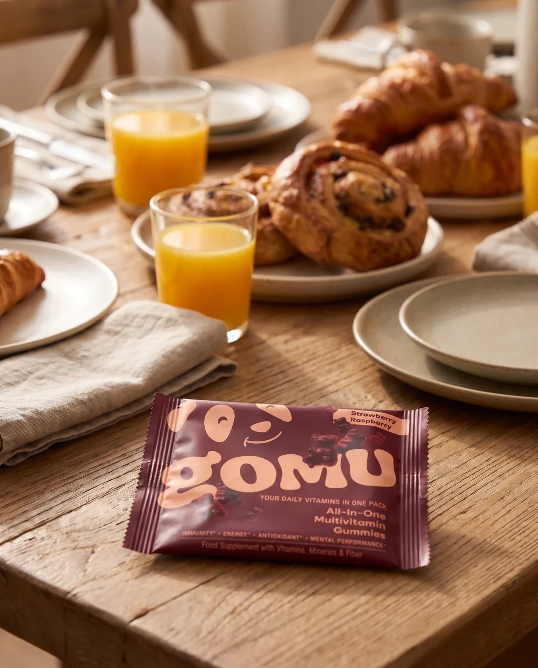 A GOMU daily sachet on a brunch table